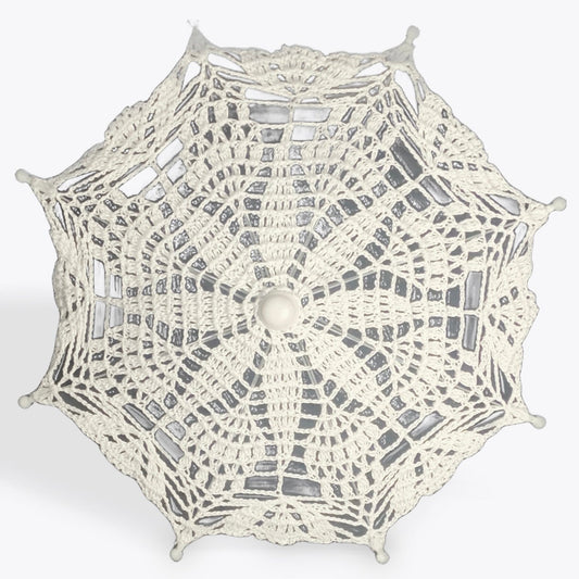 A crochet mandala of white 100% cotton is mounted on a metal parasol frame with white plastic details.
