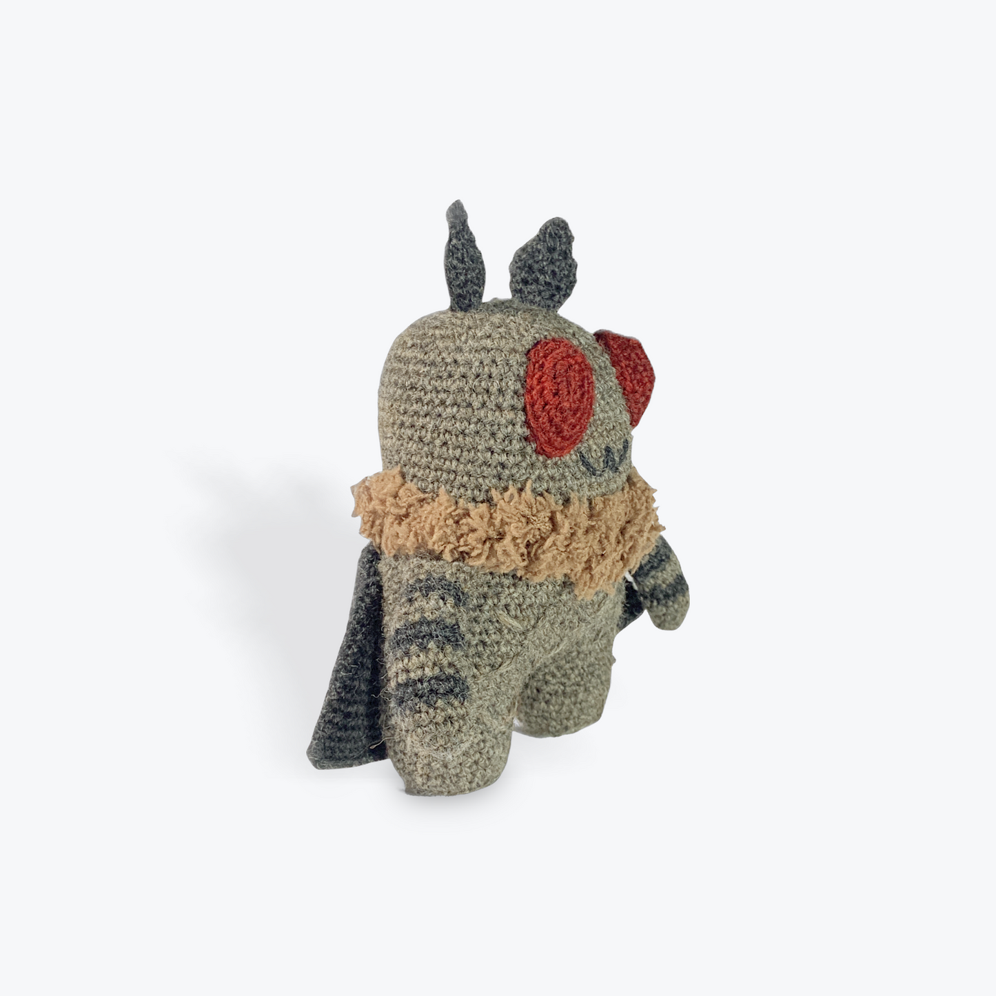 Pocket-sized Mothman in grey and black