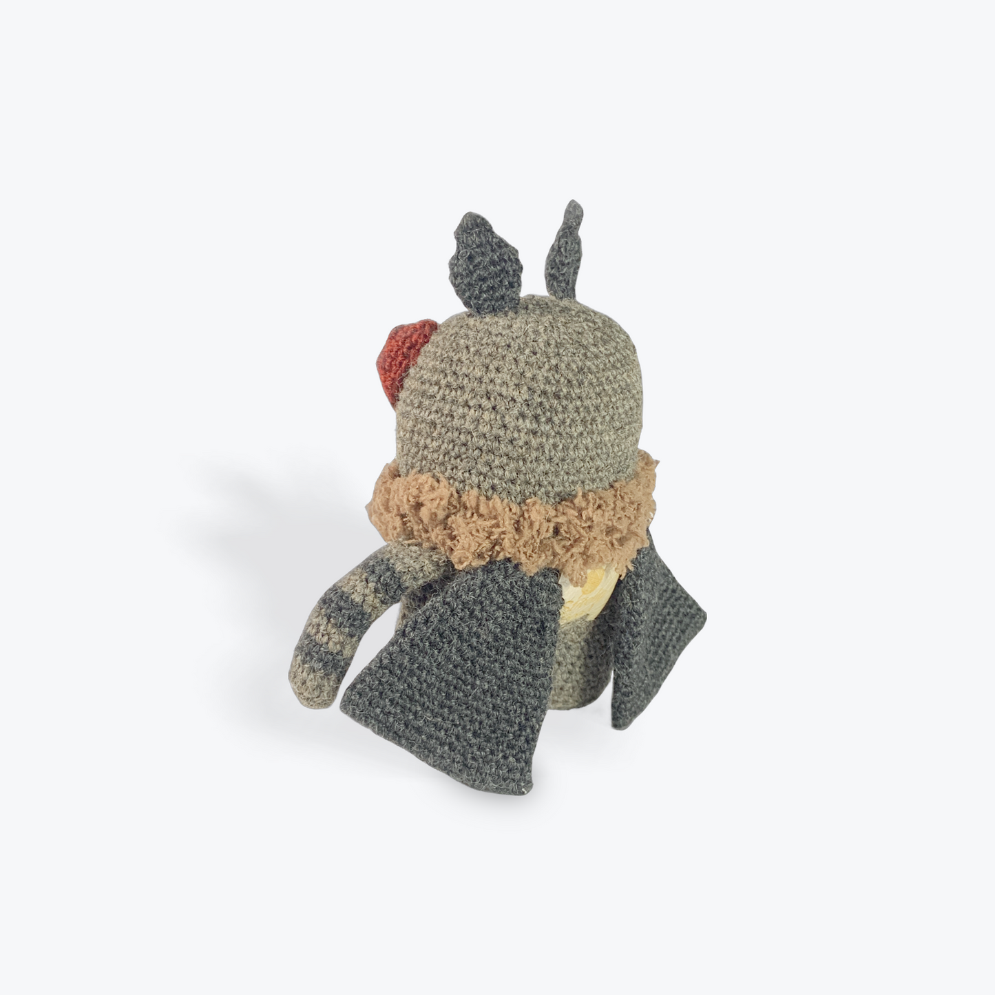 Pocket-sized Mothman in grey and black