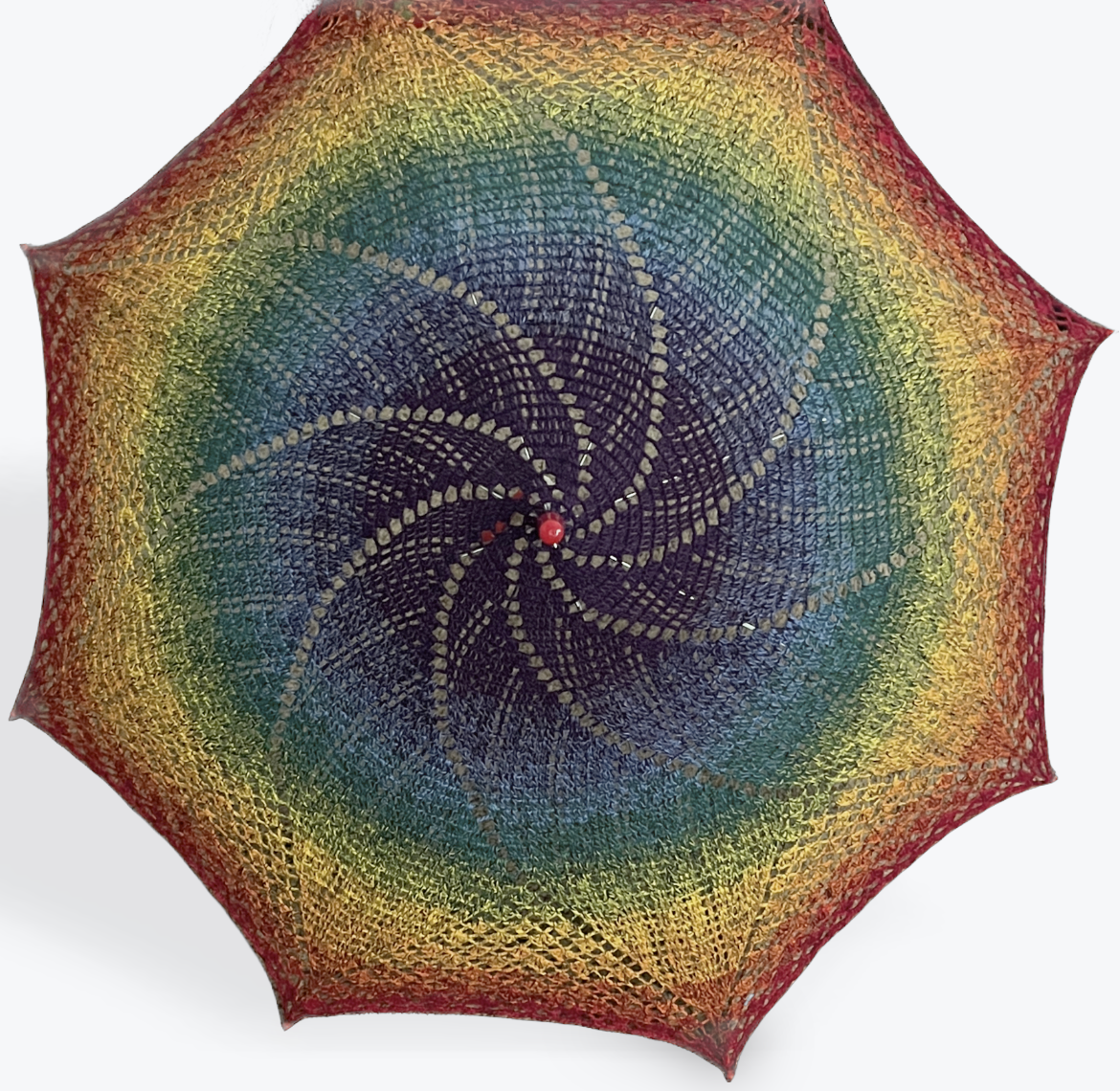 Gay Pride ROYGBIV rainbow 100% cotton doily parasol on a frame with red plastic details at the center, crooked handle, and all 8 arm tips. 